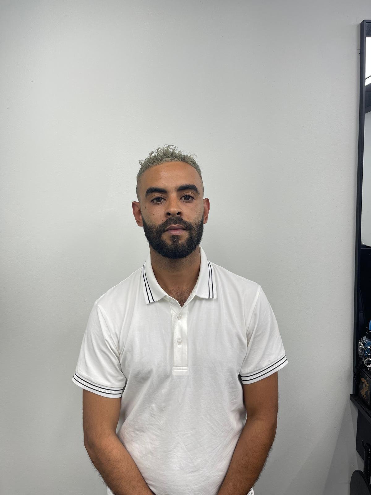 Imad — Barber at Belvedere Barbershop